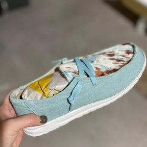 Faux cowhide mocs